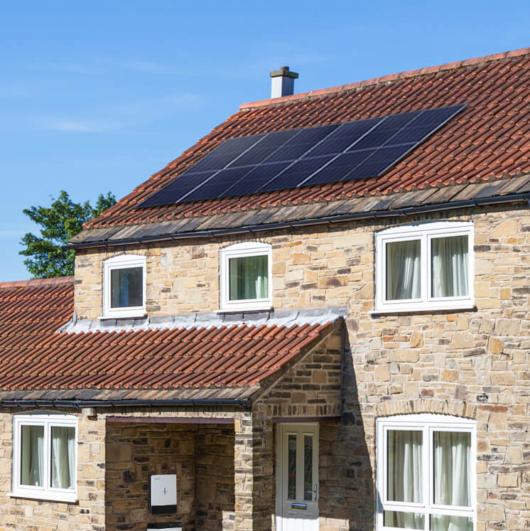 home with solar panels on the roof